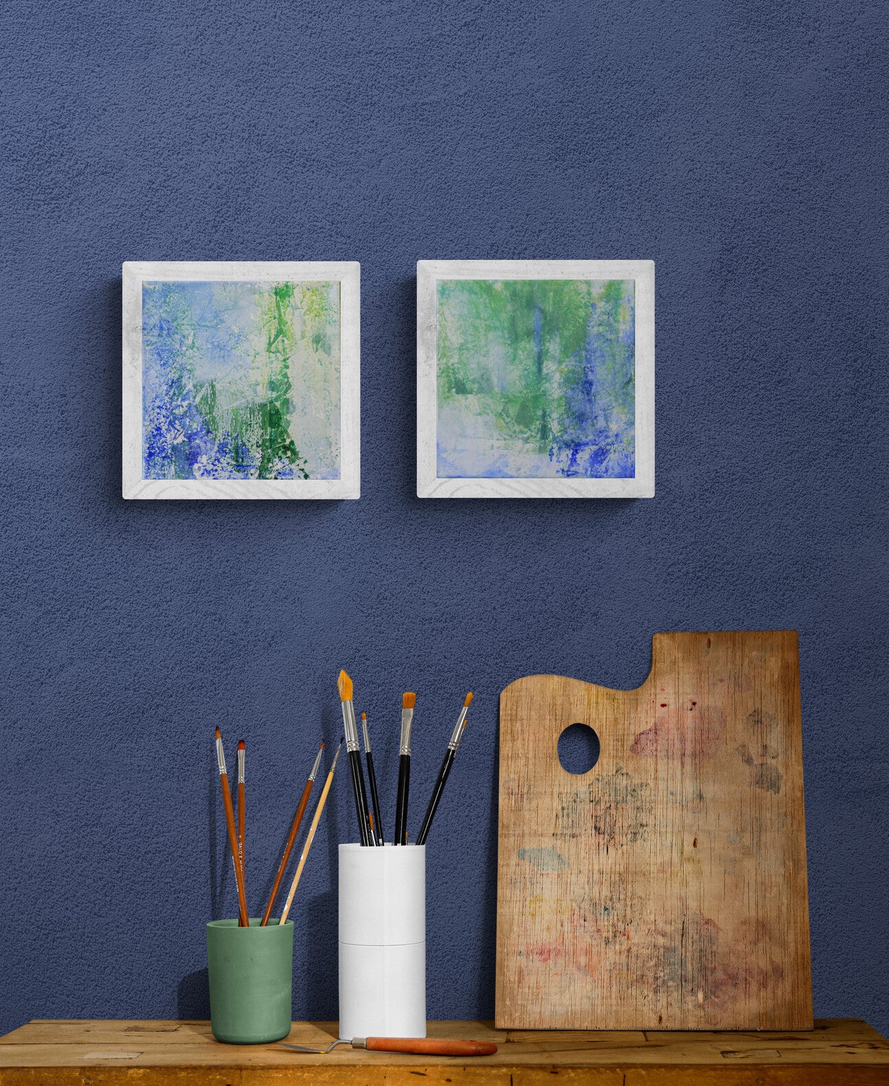 Two abstract acrylic winter landscapes